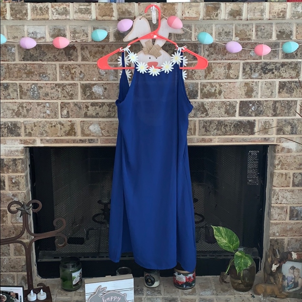 Gorgeous high neck dress with a daisy trim